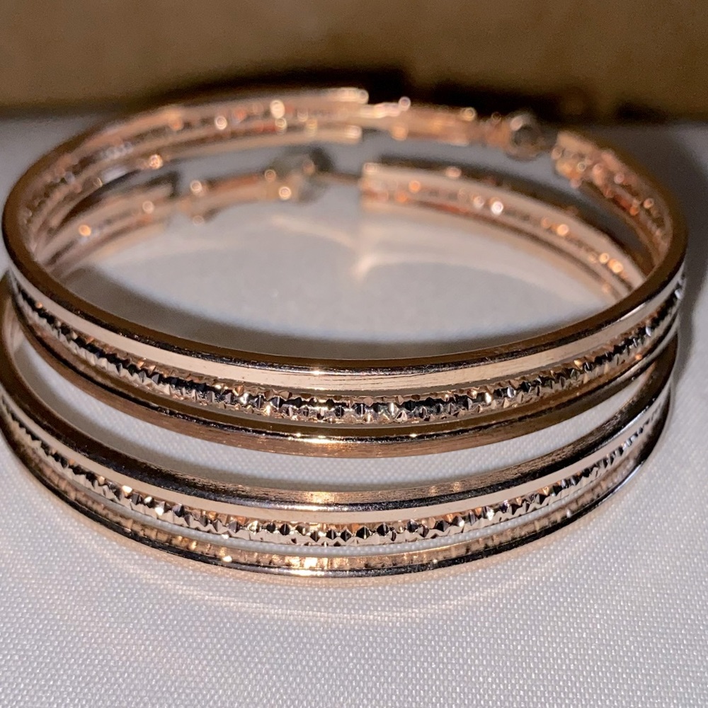 Rose colored hoop earrings.